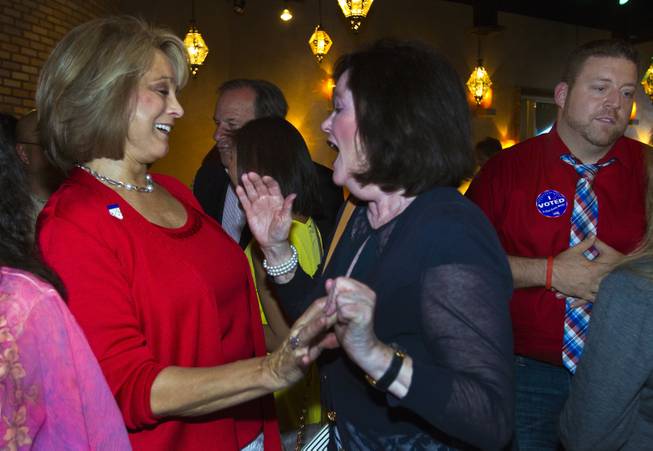Lieutenant Governor candidate Sue Lowden shares a few words with a supporter as Republicans gather at Mundo restaurant on Monday, June 9, 2014.