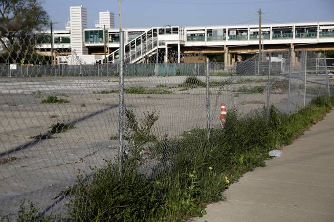 Several empty lots on the corner of 55th Street and Dr. Martin Luther King, Jr. Drive between Washington Park and the CTA Green Line Garfield Station, seen, June 3, 2014, is one of three proposed locations for the Obama Presidential Library.