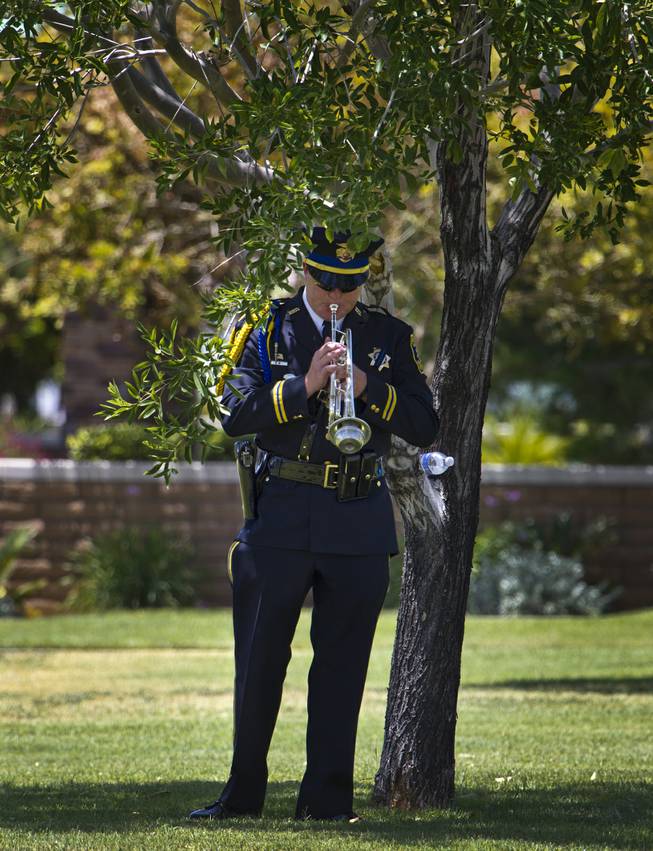 One of several buglers at the funeral services for slain Metro Officer Igor Soldo at the Palm Mortuary on Thursday, June 12, 2014.