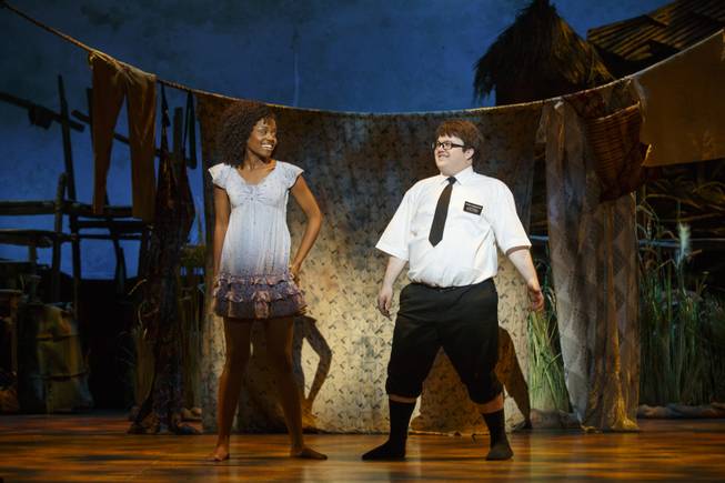 Denee Benton and Cody Jamison Strand in the second national tour of the nine-time Tony Award-winning “The Book of Mormon” now at the Smith Center for the Performing Arts through July 6, 2014.

