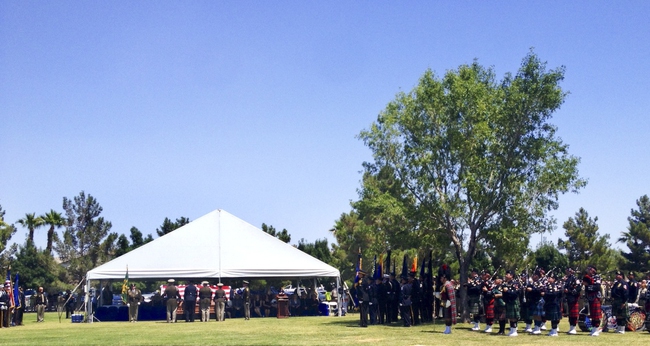 Metro Police Motorcycle Officers and other department officers honor slain Metro Officer Igor Soldo during funeral service at Palm Mortuary Cemetery on Thursday, June 12, 2014.