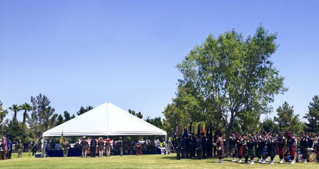 Metro Police Motorcycle Officers and other department officers honor slain Metro Officer Igor Soldo during funeral service at Palm Mortuary Cemetery on Thursday, June 12, 2014.