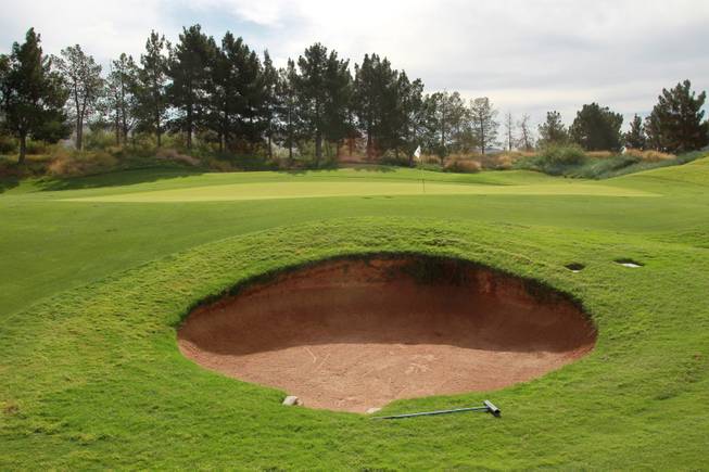 A pot bunker protects the 4th hole at Royal Links Golf Club May 28, 2014.