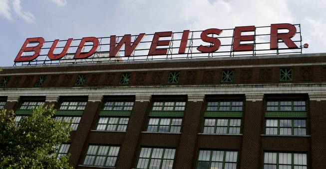 The name Budweiser is seen spelled out above the Bevo Building on the brewery's St. Louis complex Tuesday, July 26, 2005.