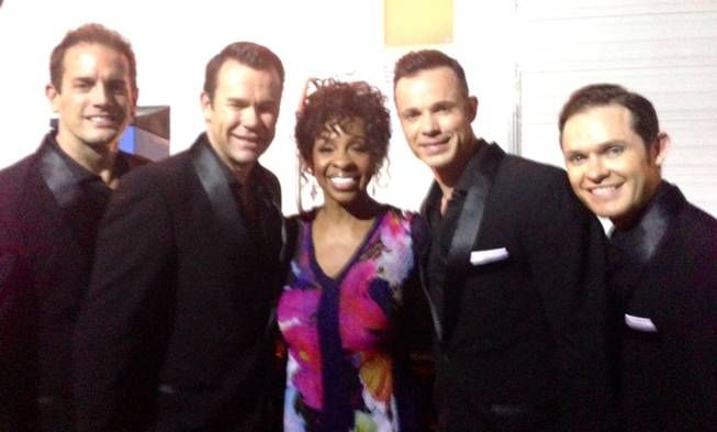 Gladys Knight is flanked by Venetian headliners Human Nature at the Apollo Theater's 80th anniversary celebration at Apollo Theater in New York on Tuesday, June 10, 2014.