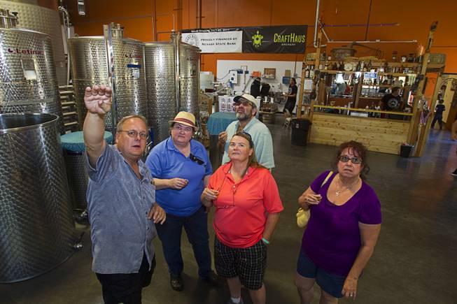 Guests take a tour of the Las Vegas Distillery during "Bourbon Day" at the distillery in Henderson Saturday, June 14, 2014. The "Nevada 150" bourbon whiskey, the first bourbon produced in Nevada, is named for Nevada's sesquicentennial.
