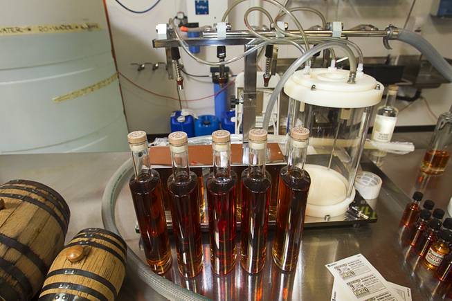 Bottles of "Nevada 150" bourbon whiskey wait for labels during "Bourbon Day" at the Las Vegas Distillery in Henderson Saturday, June 14, 2014. The bourbon whiskey, the first bourbon produced in Nevada, is named for Nevada's sesquicentennial.