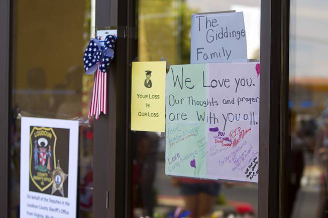 A sign of support is shown during "Sharing Our Support," a fundraiser for the families of Metro Police Officers Igor Soldo and Alyn Beck, at CiCi's Pizza Sunday, June 15, 2014. The officers were ambushed and killed at the restaurant while eating lunch on Sunday, June 8. One hundred percent of the Sunday sales will go the families of the fallen officers and Joseph Willcox, the victim killed at the Wal-Mart, said store owner Mike Haskins.