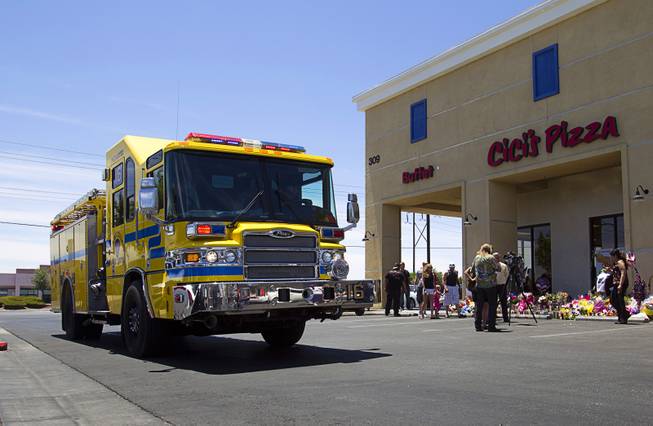 Clark County Firefighters arrive for "Sharing Our Support," a fundraiser for the families of Metro Police Officers Igor Soldo and Alyn Beck, at CiCi's Pizza Sunday, June 15, 2014. The officers were ambushed and killed at the restaurant while eating lunch on Sunday, June 8. One hundred percent of the Sunday sales will go the families of the fallen officers and Joseph Willcox, the victim killed at the Wal-Mart, said store owner Mike Haskins.