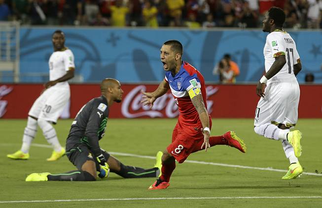 United States' Clint Dempsey turns away and celebrates after scoring the opening goal during the group G World Cup soccer match between Ghana and the United States at the Arena das Dunas in Natal, Brazil, Monday, June 16, 2014.