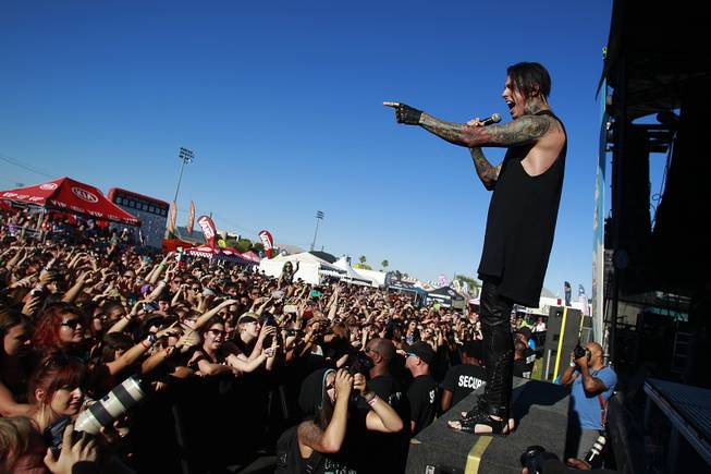 Ronnie Radke and Falling in Reverse perform during the Las Vegas stop of the Vans Warped Tour Thursday, June 19, 2014.