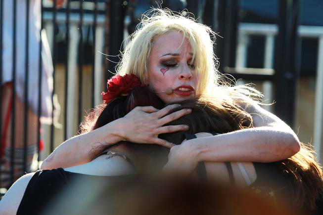 Emilie Autumn hugs fans during her performance titled "The Asylum For Wayward Victorian Girls" during the Las Vegas stop of the Vans Warped Tour Thursday, June 19, 2014.