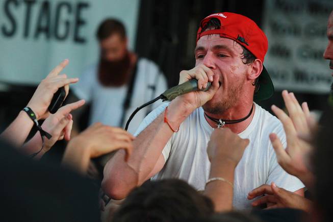Lead singer Garret Rapp performs with the band The Color Morale during the Las Vegas stop of the Vans Warped Tour Thursday, June 19, 2014.