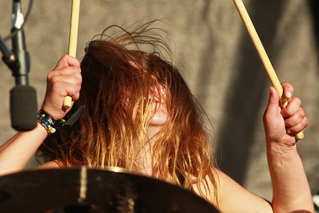 Drummer Katie Cole performs with Dangerkids during the Las Vegas stop of the Vans Warped Tour Thursday, June 19, 2014.
