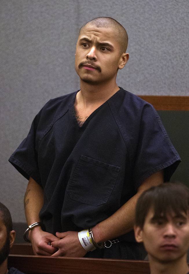 Julio Renteria stands before the judge during his preliminary hearing at the Justice Center with Adrian McClintock on Friday, June 20, 2014. The two are suspects in a Boulder Highway carjacking gone awry that ended in Dylan Joshua Salazar's fatal shooting.