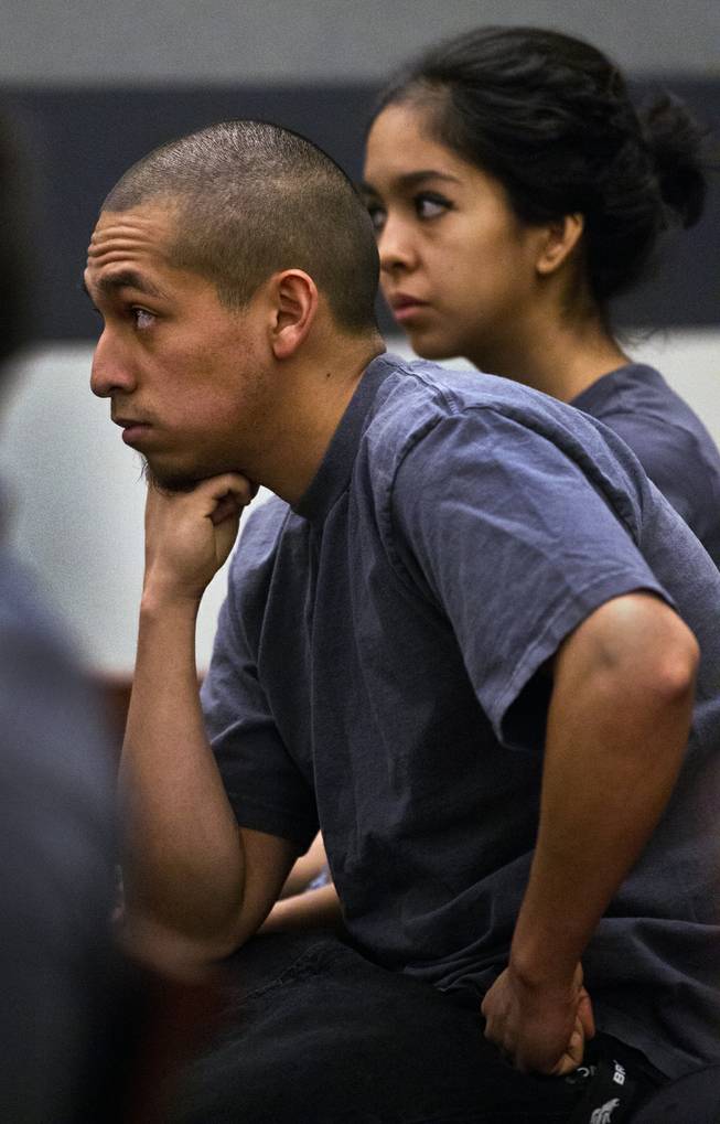 Attendees listen during the preliminary hearing for Julio Renteria and Adrian McClintock, suspects in a Boulder Highway carjacking gone awry that ended in Dylan Joshua Salazar's fatal shooting on Friday, June 20, 2014.
