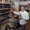 Joe McColgan of Wescott Electric Co. in Aston, Pa., shows a roll of bare copper wire like the ones his former employee James Bryan used to steal to sell to scrap dealers to fund a gambling addiction.