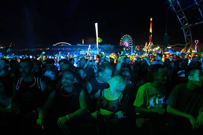 Fans watch a set by Booka Shade during the first night of the Electric Daisy Carnival Saturday, June 21, 2014 at the Las Vegas Motor Speedway.