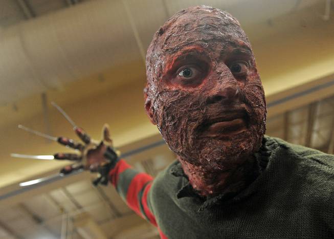 Andrew Meyers poses as movie dream killer Freddy Krueger during the first day of the Las Vegas Comic Con at the South Point Convention Center on Saturday, June 21, 2014.