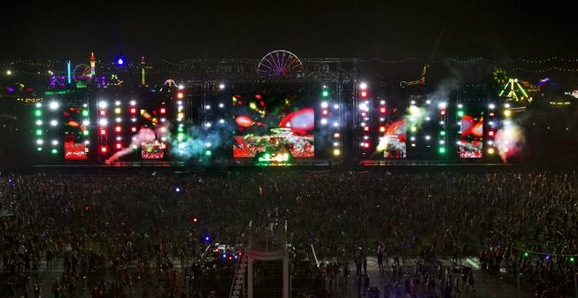 Thousands of attendees pack about the cosmic MEADOW stage on opening night of EDC at the Las Vegas Motor Speedway on Friday, June 20, 2014.