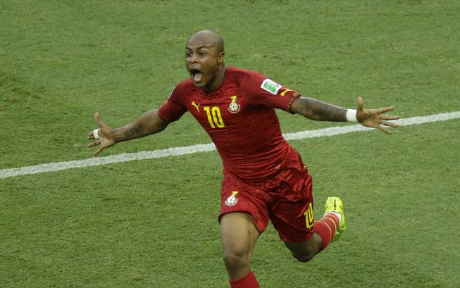 Ghana's Andre Ayew celebrates scoring his side's first goal during the World Cup soccer match between Germany and Ghana at the Arena Castelao in Fortaleza, Brazil, on Saturday, June 21, 2014.