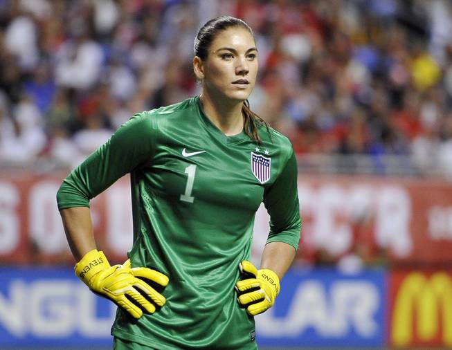 In this Oct. 20, 2013, file photo, U.S. goalkeeper Hope Solo pauses on the field during the second half of an international friendly women's soccer match against Australia in San Antonio.