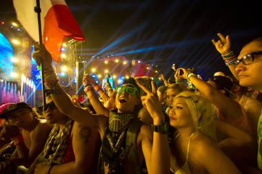 Attendees dance to the music of Kaskade during night 2 of EDC, Saturday June 21, 2014 at the Las Vegas Motor Speedway.