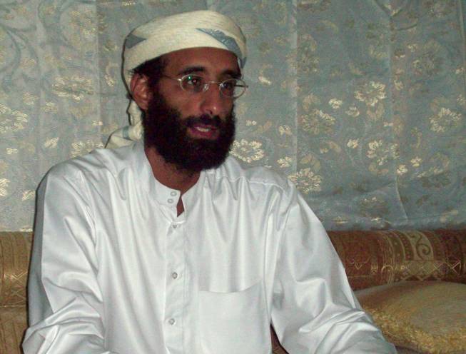 This October 2008 file photo shows Imam Anwar al-Awlaki in Yemen. A federal appeals court on Monday, June 23, 2014, released a previously secret memo that provided legal justification for using drones to kill Americans suspected of terrorism overseas. The memo pertained specifically to the September 2011 drone-strike killing in Yemen of Anwar Al-Awlaki, an al-Qaida leader who had been born in the United States.