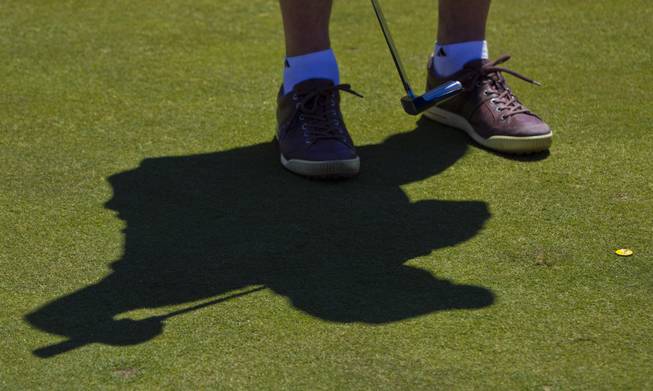 Michael Rubino putts as HELP of Southern Nevada hosts its 20th Annual Golfers Roundup at Cascata Golf Course in Boulder City on Tuesday, June 24, 2014.