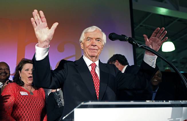 U.S. Sen. Thad Cochran, R-Miss., waves to supporters and volunteers at his runoff election victory party Tuesday, June 24, 2014, at the Mississippi Children's Museum in Jackson, Miss. 