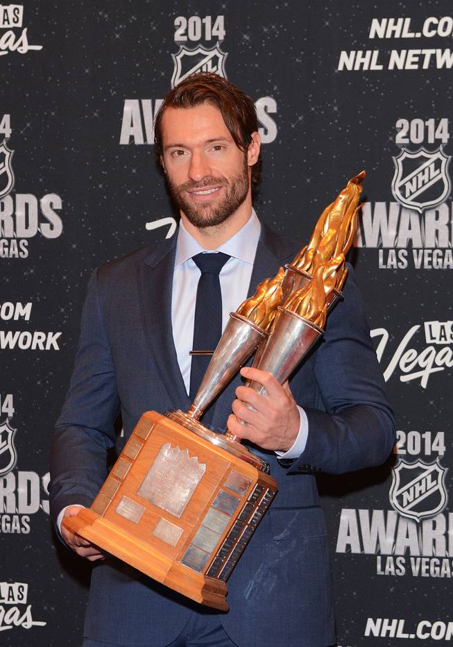 Dominic Moore of the New York Rangers with the Bill Masterton Memorial Trophy at the 2014 NHL Awards in Encore Theater on Tuesday, June 24, 2014, at Wynn Las Vegas.