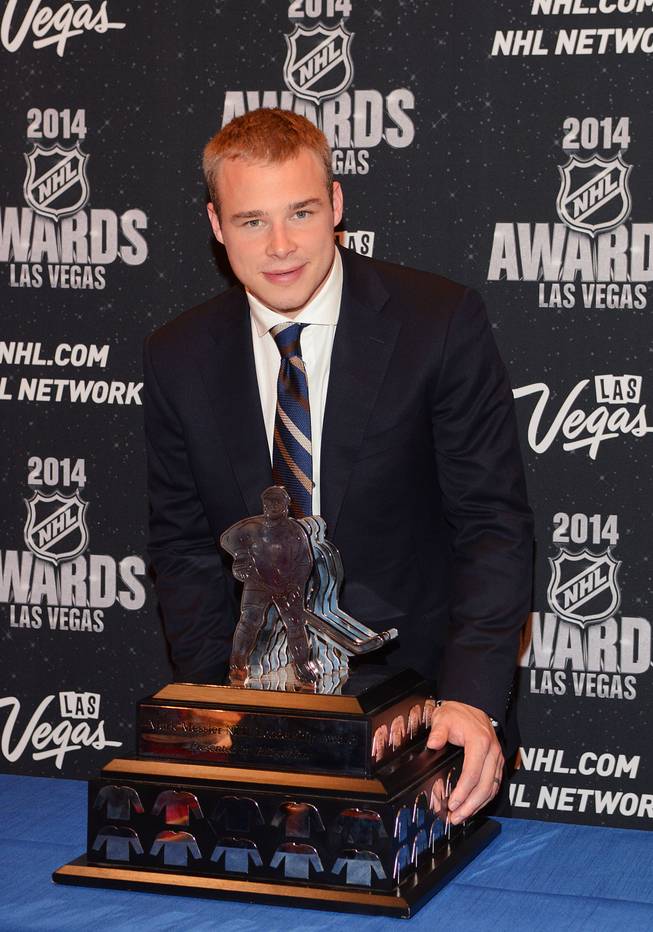Dustin Brown of the Los Angeles Kings with the Bridgestone Messier Leadership Award at the 2014 NHL Awards in Encore Theater on Tuesday, June 24, 2014, at Wynn Las Vegas.