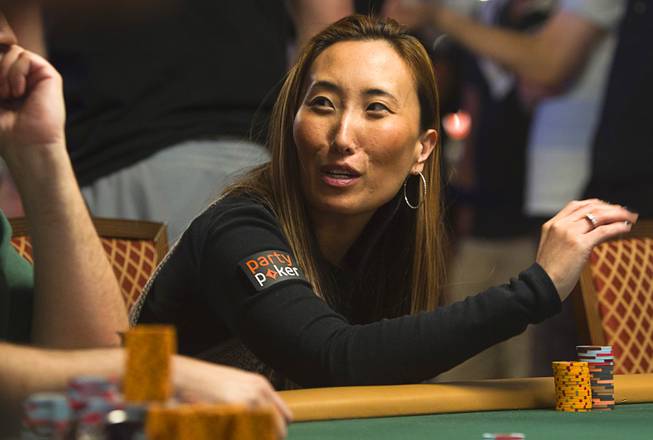 Poker player Melissa Burr competes in the $50,000 World Series of Poker's Players' Championship at the Rio Wednesday, June 25, 2014.