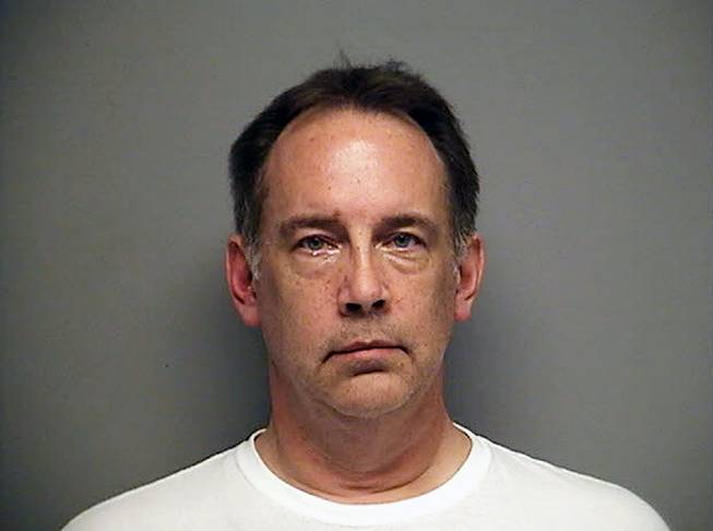 In this undated booking photo, Steven Zelich is seen. The former police officer was charged Thursday, June 26, 2014, with hiding a corpse after the bodies of two women were found stuffed in suitcases.