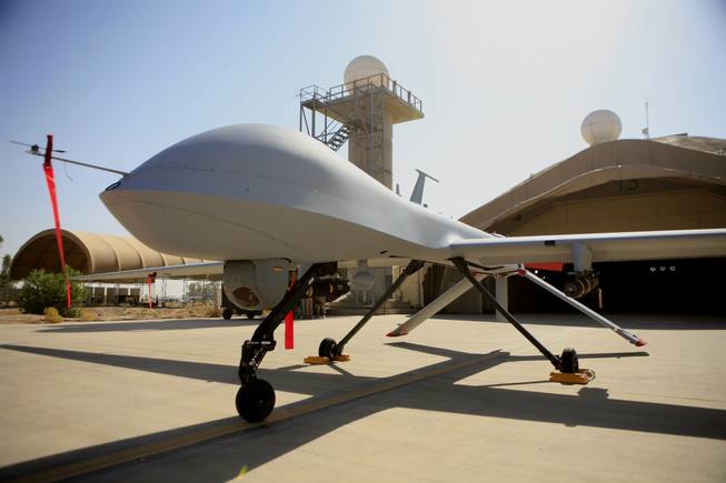 This June 21, 2007, file photo shows an MQ-4 Predator drone controlled by the 46th Expeditionary Reconnaissance Squadron on the tarmac at Balad Air Base, north of Baghdad, Iraq.