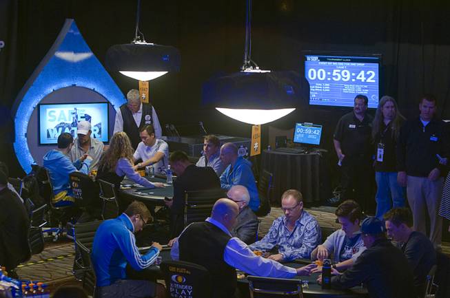 Poker players compete in the Big One for One Drop, a $1,000,000 buy-in No-Limit Hold'em charity poker tournament, at the Rio Sunday, June 26, 2014. The $1 million buy-in is the largest ever for a poker event. Proceeds support One Drop projects in countries experiencing serious difficulties caused by inadequate access to water.