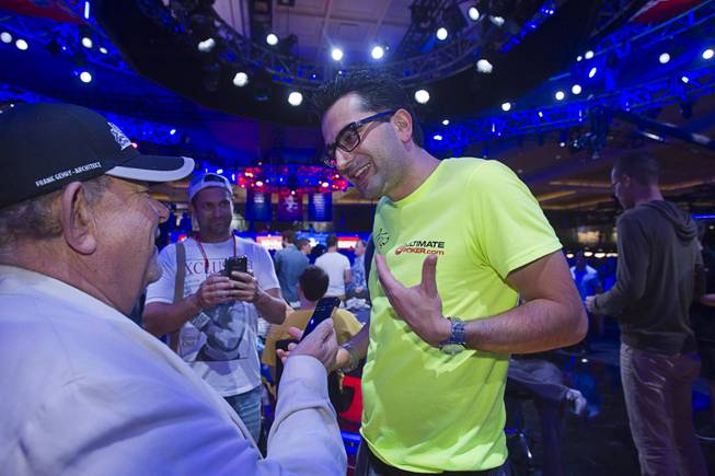 Antonio Esfandiari, Big Drop 2012 champion, is interviewed by Robin Leach before the start of the Big One for One Drop, a $1,000,000 buy-in No-Limit Hold'em charity poker tournament, at the Rio Sunday, June 26, 2014. The $1 million buy-in is the largest ever for a poker event. Proceeds support One Drop projects in countries experiencing serious difficulties caused by inadequate access to water.