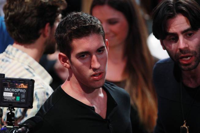 Tournament winner Daniel Colman avoids interviews after winning the final table of the Big One for One Drop tournament at the World Series of Poker on Tuesday, July 1, 2014, at the Rio. Colman took home first place and $15,306,668 in prize money.