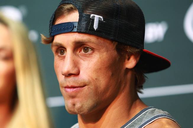 Urijah Faber looks out towards fans during the open workout for UFC 175 Wednesday, July 2, 2014 at the Fashion Show Mall.