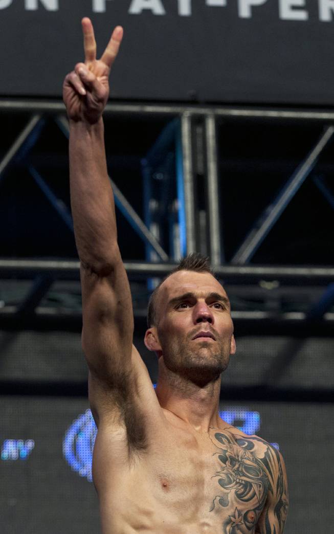 Bantamweight George Roop salutes the fans during the UFC 175 weigh ins at the Mandalay Bay Resort on Friday, July 4, 2014.