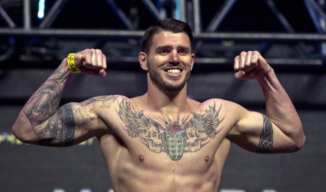 Middleweight Chris Camozzi flexes for fans during the UFC 175 weigh ins at the Mandalay Bay Resort on Friday, July 4, 2014.