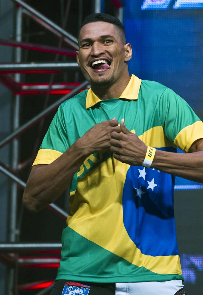 Welterweight Idlemar Alcantara enters wearing a Brazil soccer jersey during the UFC 175 weigh ins at the Mandalay Bay Resort on Friday, July 4, 2014.