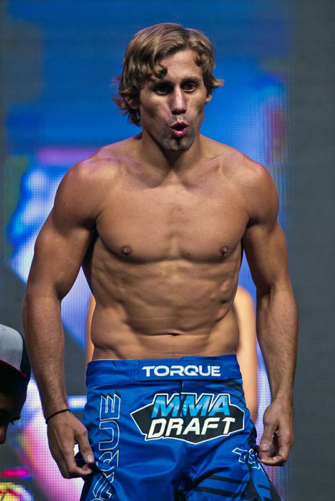 Batamweight Urijah Faber greets the fans during the UFC 175 weigh ins at the Mandalay Bay Resort on Friday, July 4, 2014.