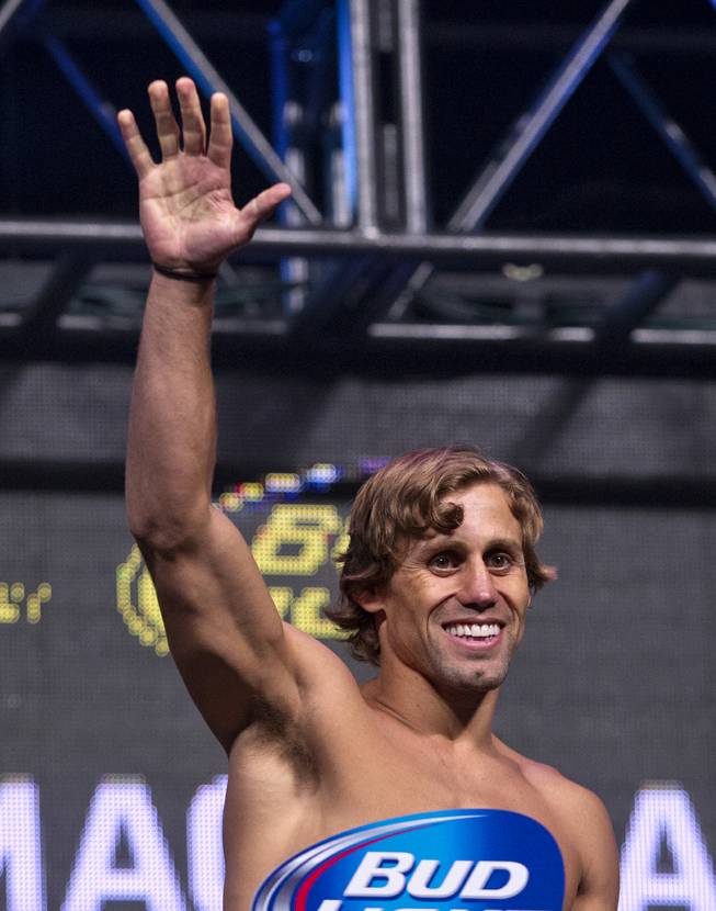Batamweight Urijah Faber waves to the fans during the UFC 175 weigh ins at the Mandalay Bay Resort on Friday, July 4, 2014.