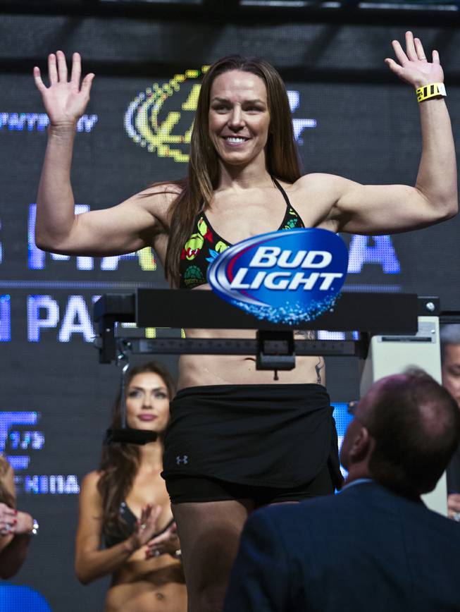 Bantamweight Alexis Davis waves to her fans during the UFC 175 weigh ins at the Mandalay Bay Resort on Friday, July 4, 2014.