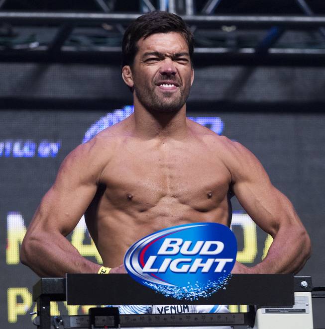 World Middleweight Championship contender Lyoto Machida flexes during the UFC 175 weigh ins at the Mandalay Bay Resort on Friday, July 4, 2014.
