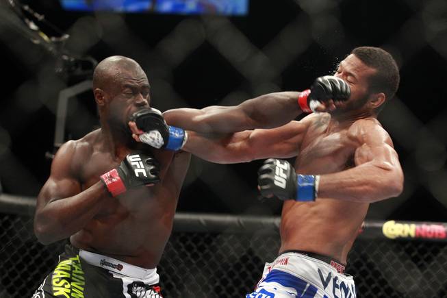 Uriah Hall, left, and Thiago Santos trade punches during their fight at UFC 175 at the Mandalay Bay Events Center Saturday, July 5, 2014. Hall won by decision.
