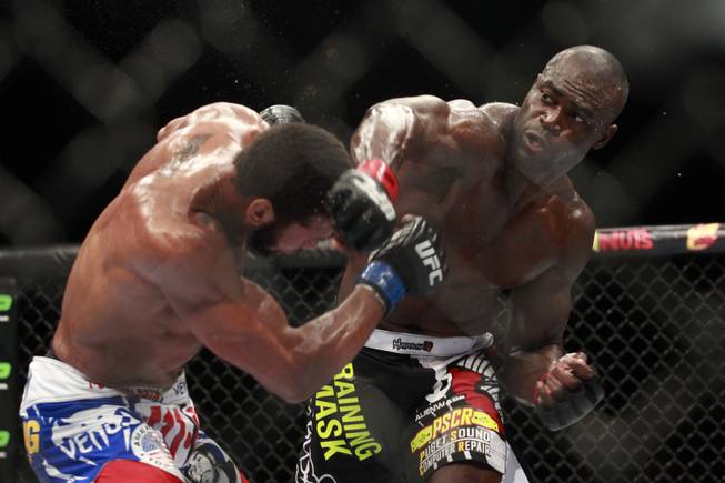 Uriah Hall hits Thiago Santos with a right during their fight at UFC 175 at the Mandalay Bay Events Center Saturday, July 5, 2014. Hall won by decision. 