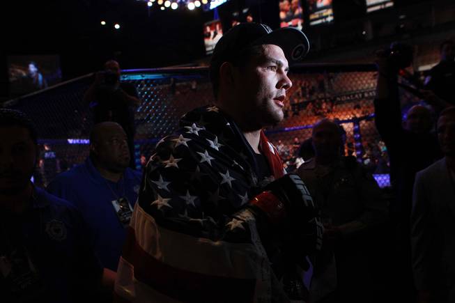 Chris Weidman leaves the arena after his fight against Lyoto Machida at UFC 175 at the Mandalay Bay Events Center Saturday, July 5, 2014. Weidman won a unanimous decision to retain his middleweight belt.