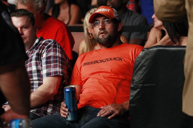 UFC welterweight champion Johnny Hendricks watches the Frankie Edgar vs. B.J. Penn fight at "The Ultimate Fighter" 19 finale Sunday, July 6, 2014 at the Mandalay Bay Events Center.
